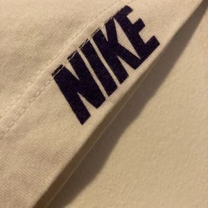 NIKE t-shirt with swoosh and block letter patterns. XXL but fits large